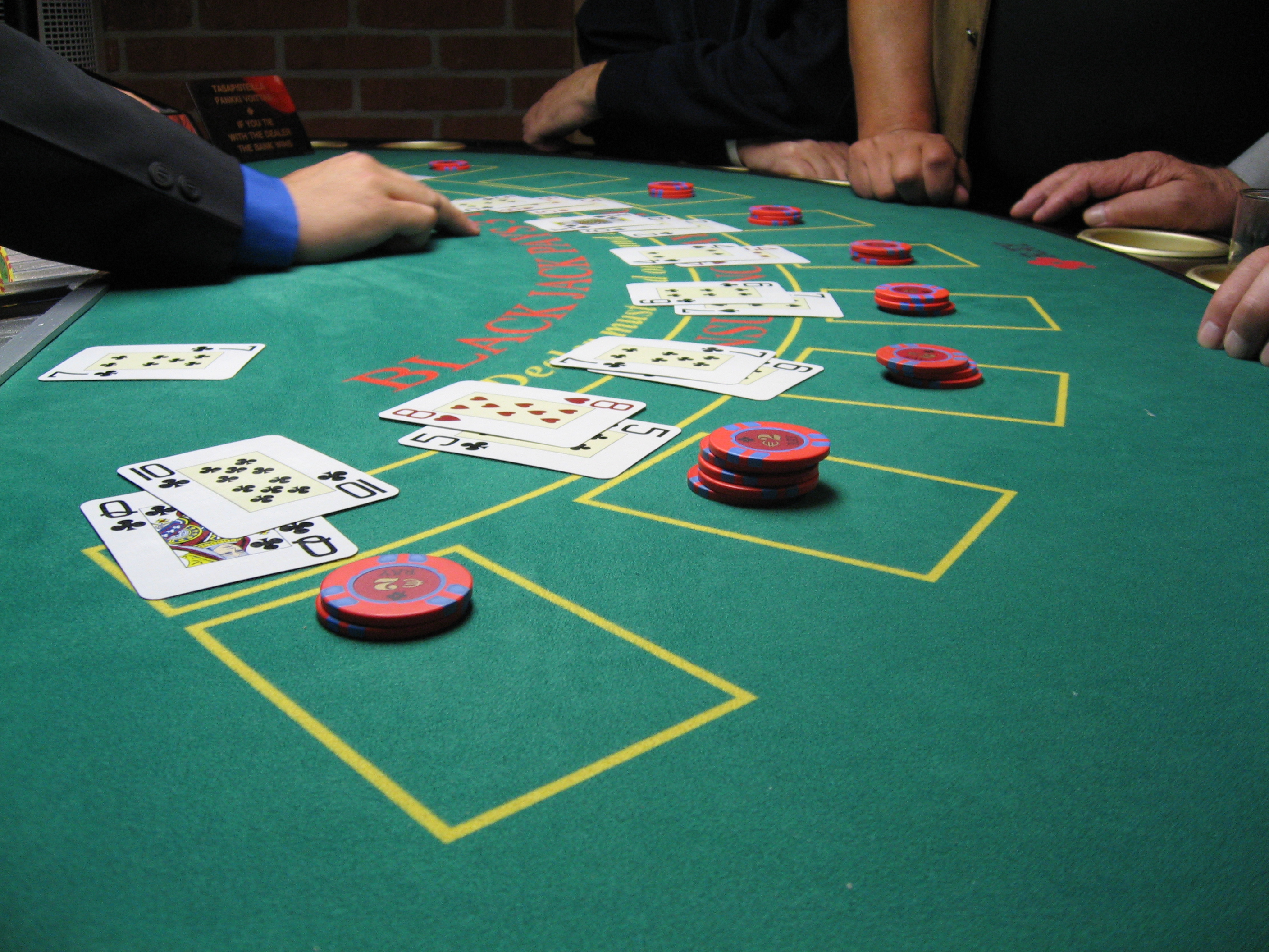 Blackjack Experience table with host dealing cards